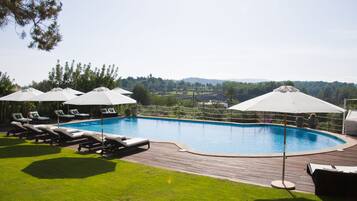 Outdoor pool, pool umbrellas, pool loungers