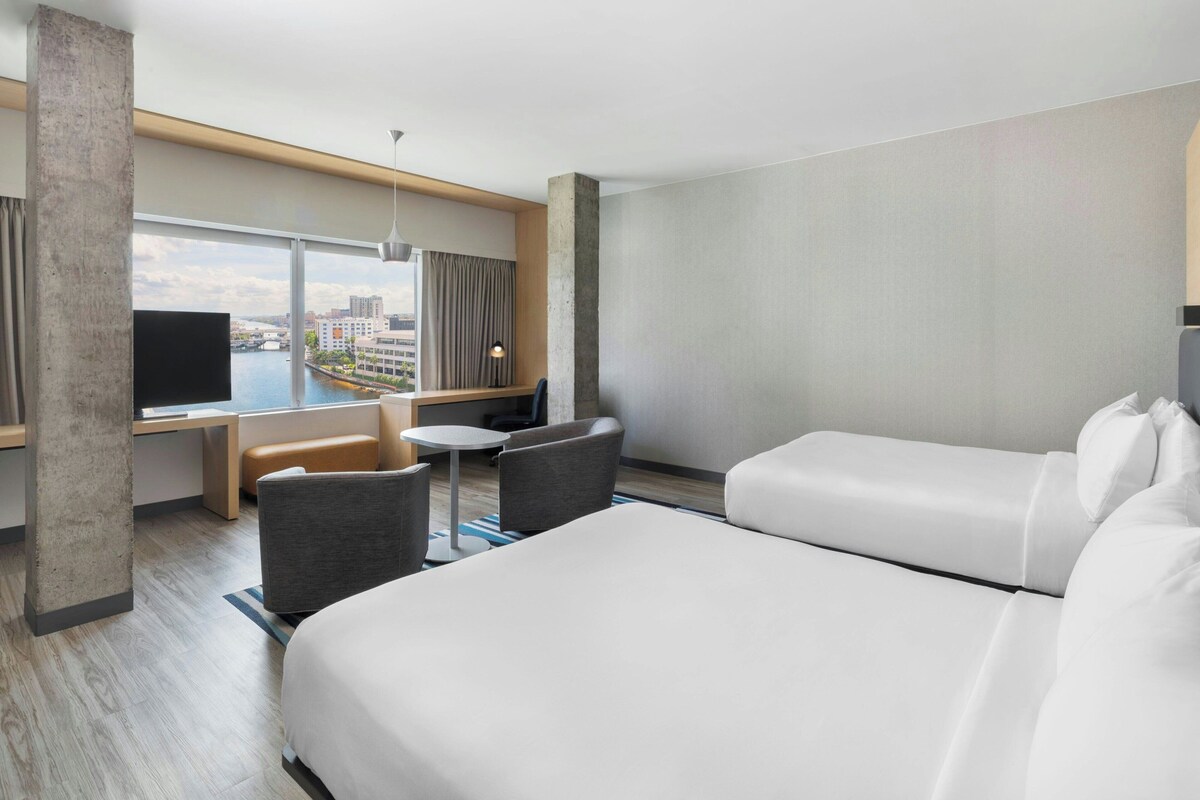 Suite, 2 Queen Beds, River View | Hypo-allergenic bedding available, in-room safe, desk, laptop workspace