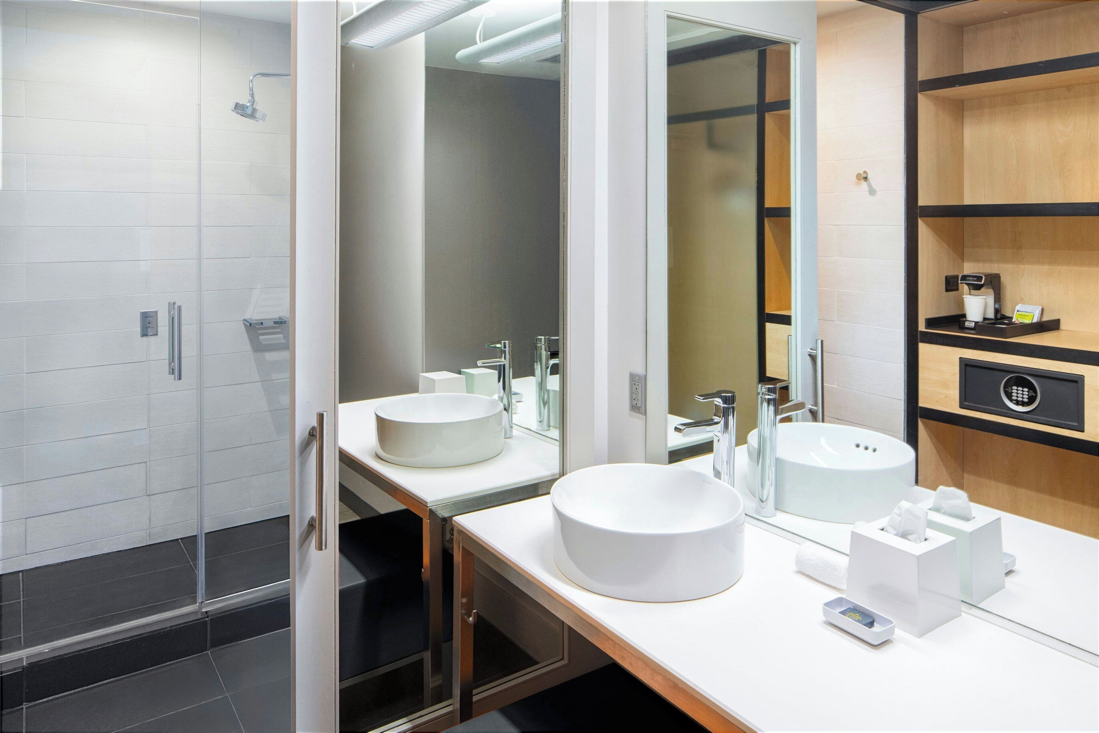 rainfall showerhead, designer toiletries, hair dryer, towels