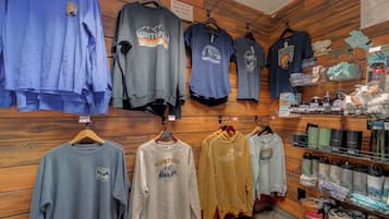 A clothing store with various Montana-themed apparel and outdoor gear.