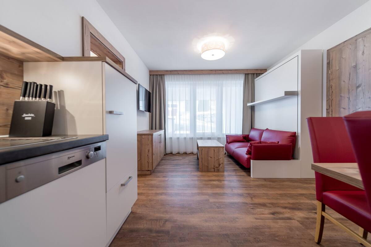 apartment, 1 bedroom, balcony, mountain view (top 5) | living area | flat-screen tv