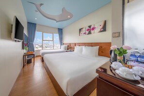 Habitación familiar | Colchones Select Comfort, minibar, caja fuerte y mobiliario individual