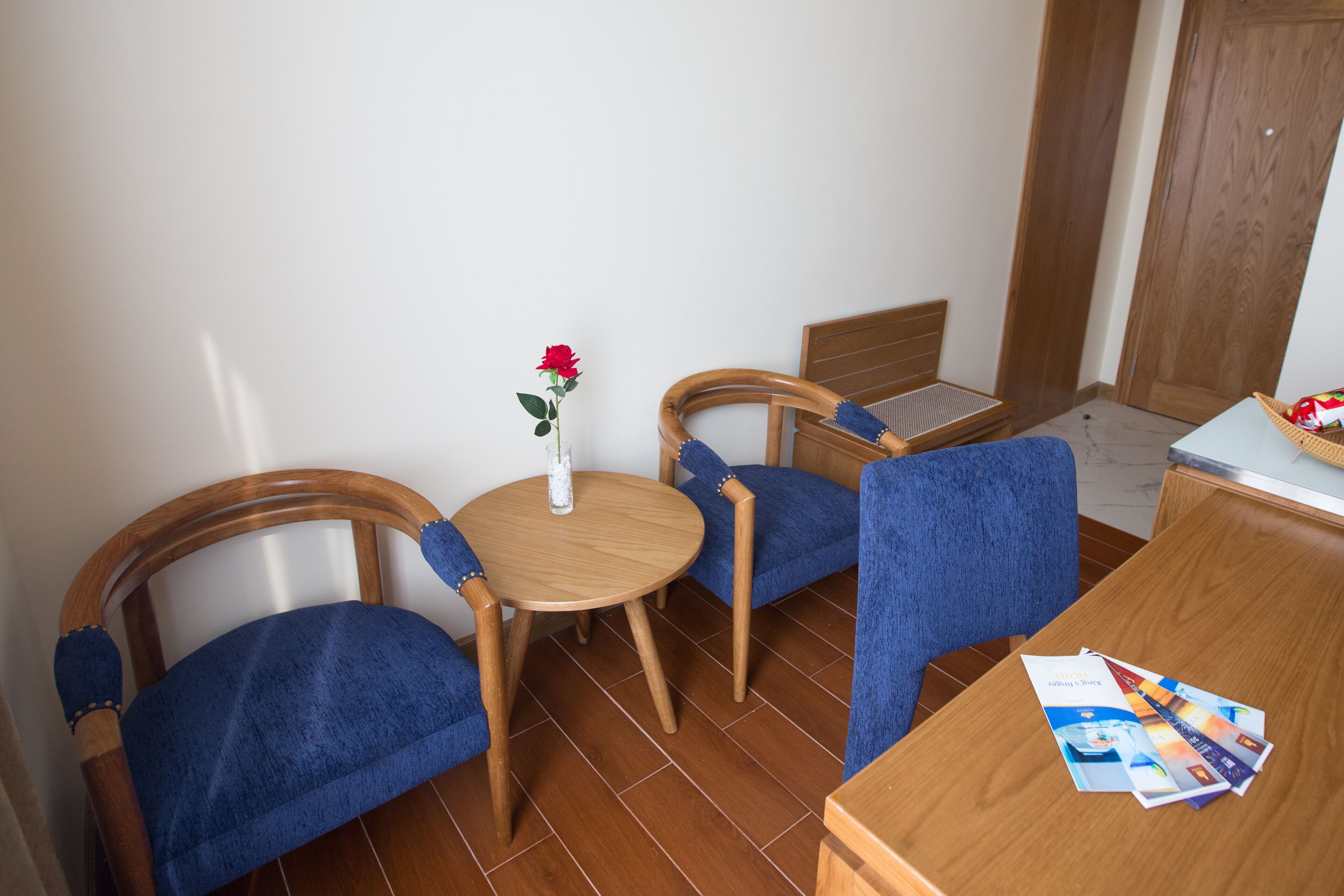 deluxe double room with partial sea view | living area | 32-inch lcd tv with cable channels, tv