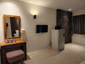 Habitación doble Deluxe | Cortinas blackout y ropa de cama 
