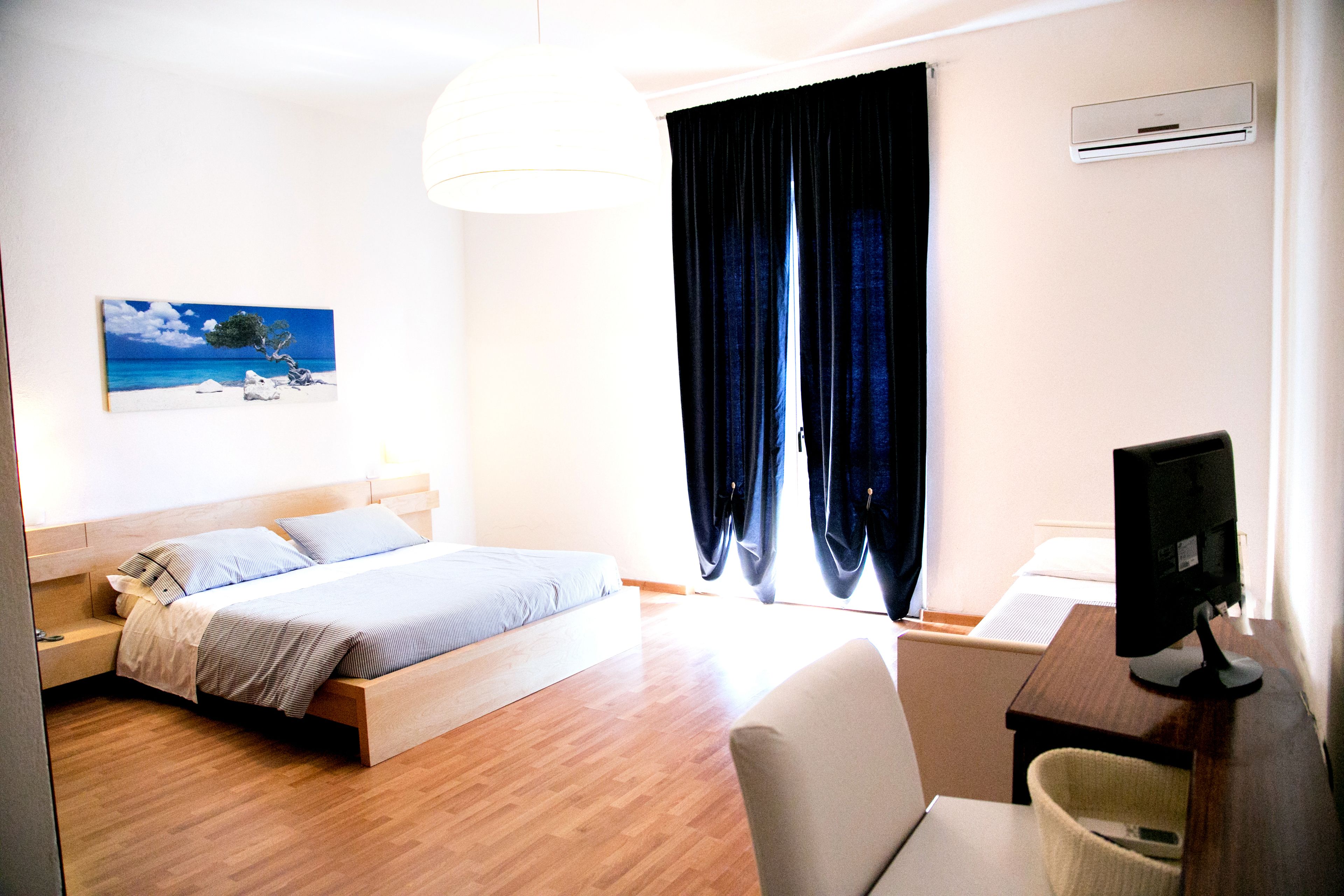 quadruple room, balcony | in-room safe, desk, blackout curtains, free wifi
