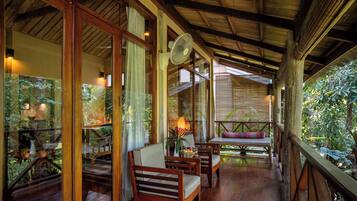 Private Bungalow Garden View | Minibar, in-room safe, desk, laptop workspace