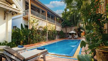 Deluxe Room, 1 Double or 2 Twin Beds, Pool View | Minibar, in-room safe, desk, laptop workspace