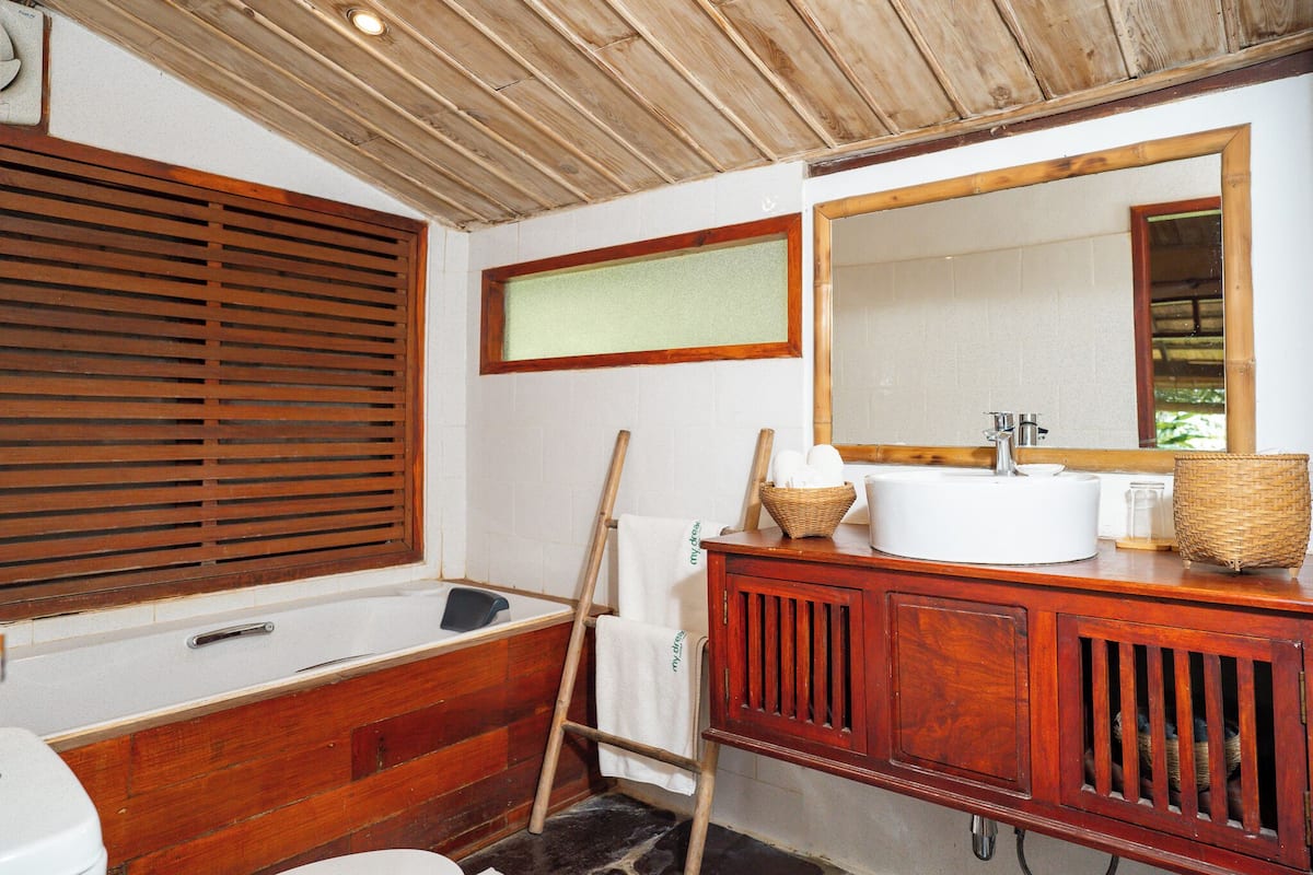 Family Suite, 2 Bedrooms, Garden View | Bathroom | Shower, free toiletries, hair dryer, bathrobes