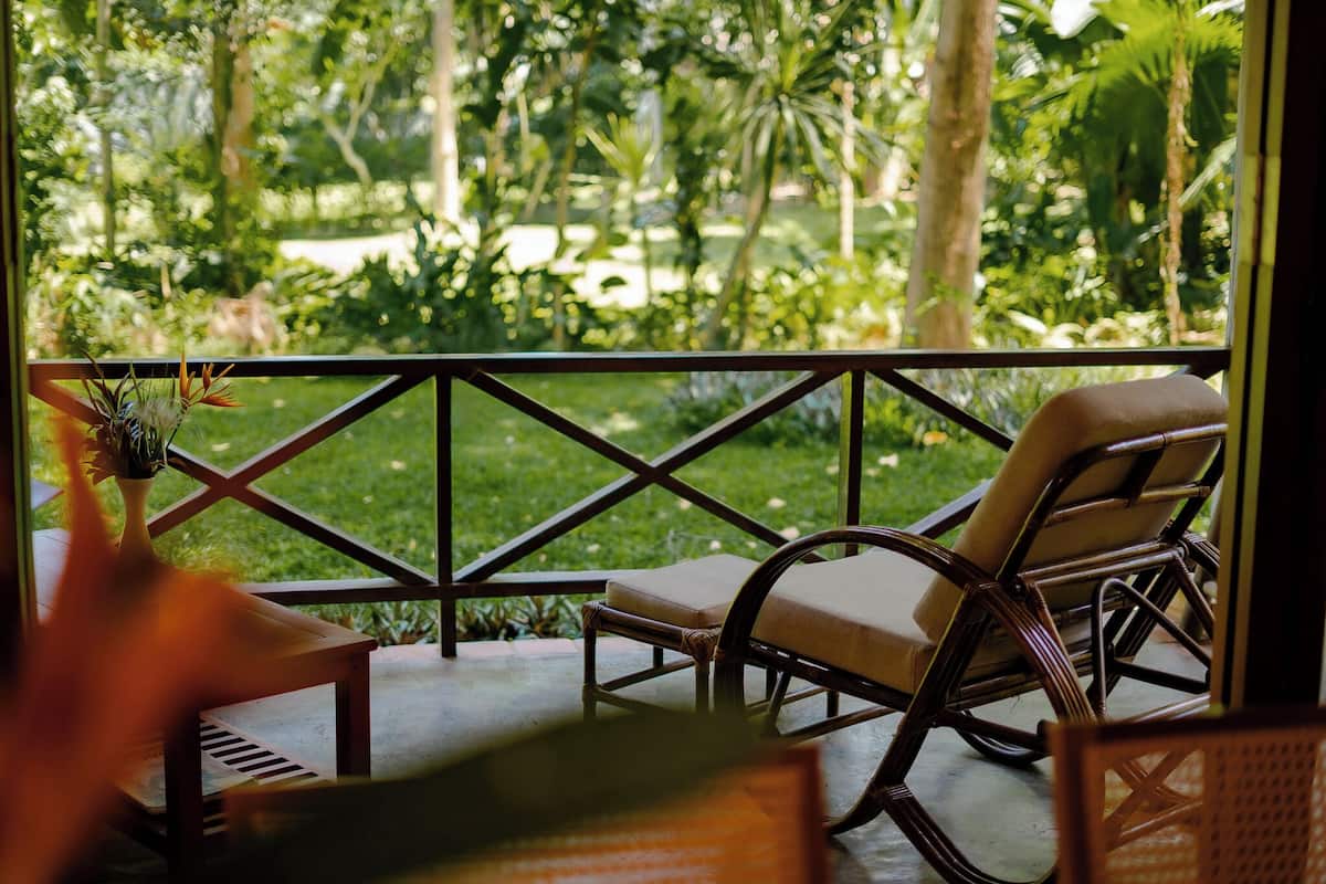 Family Room, 1 Bedroom, Garden View, Garden Area | Minibar, in-room safe, desk, laptop workspace