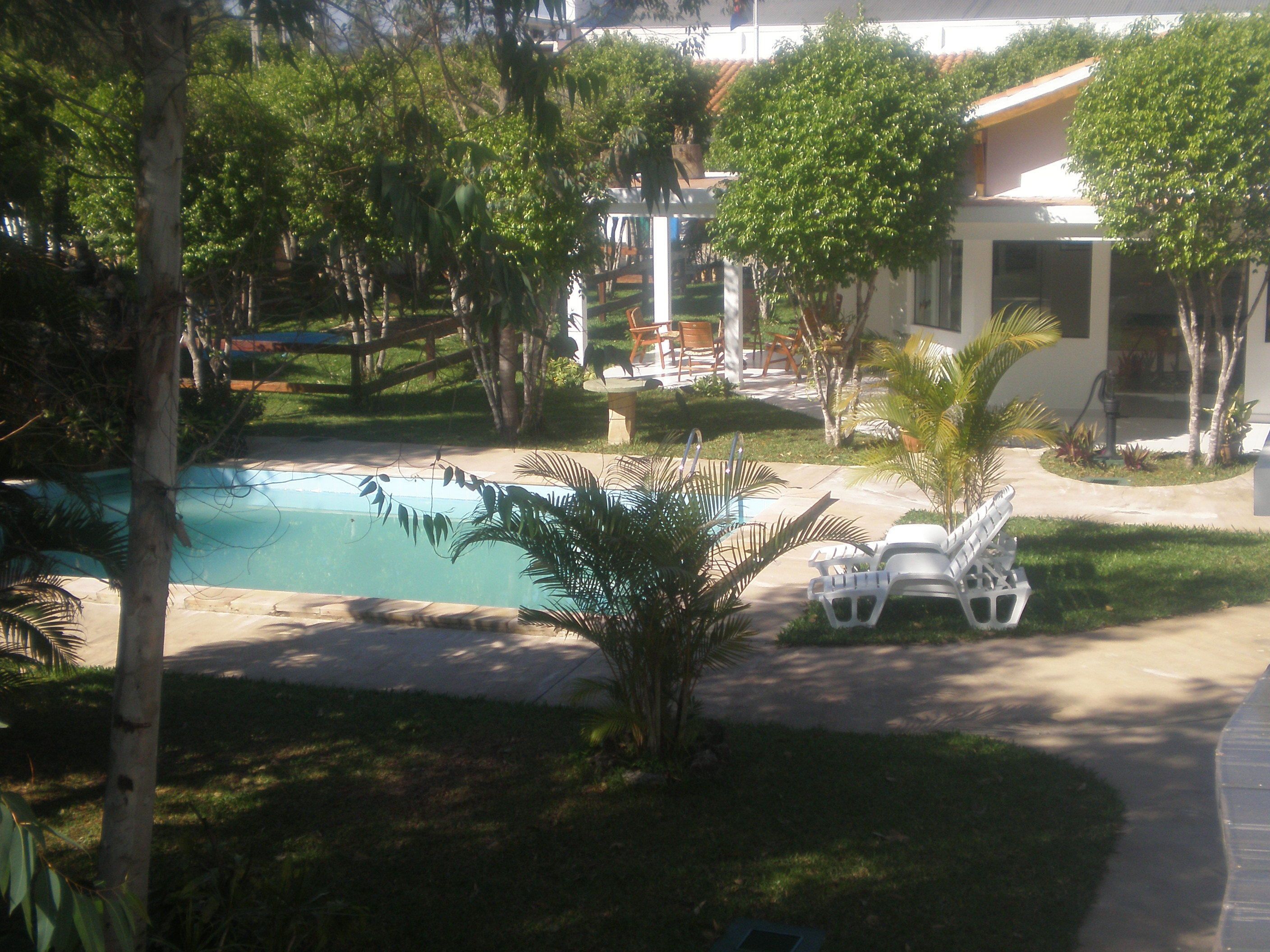 outdoor pool, pool loungers