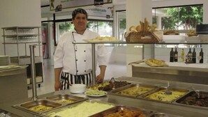 A buffet area with various food options in metal trays. - Ruta del Sol (San Bernardino)