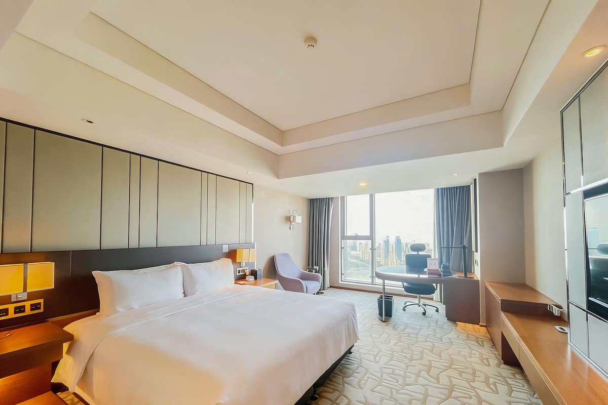 Habitación Deluxe, 1 cama de matrimonio grande, vistas al río | Ropa de cama de alta calidad, edredones de plumas, minibar y caja fuerte