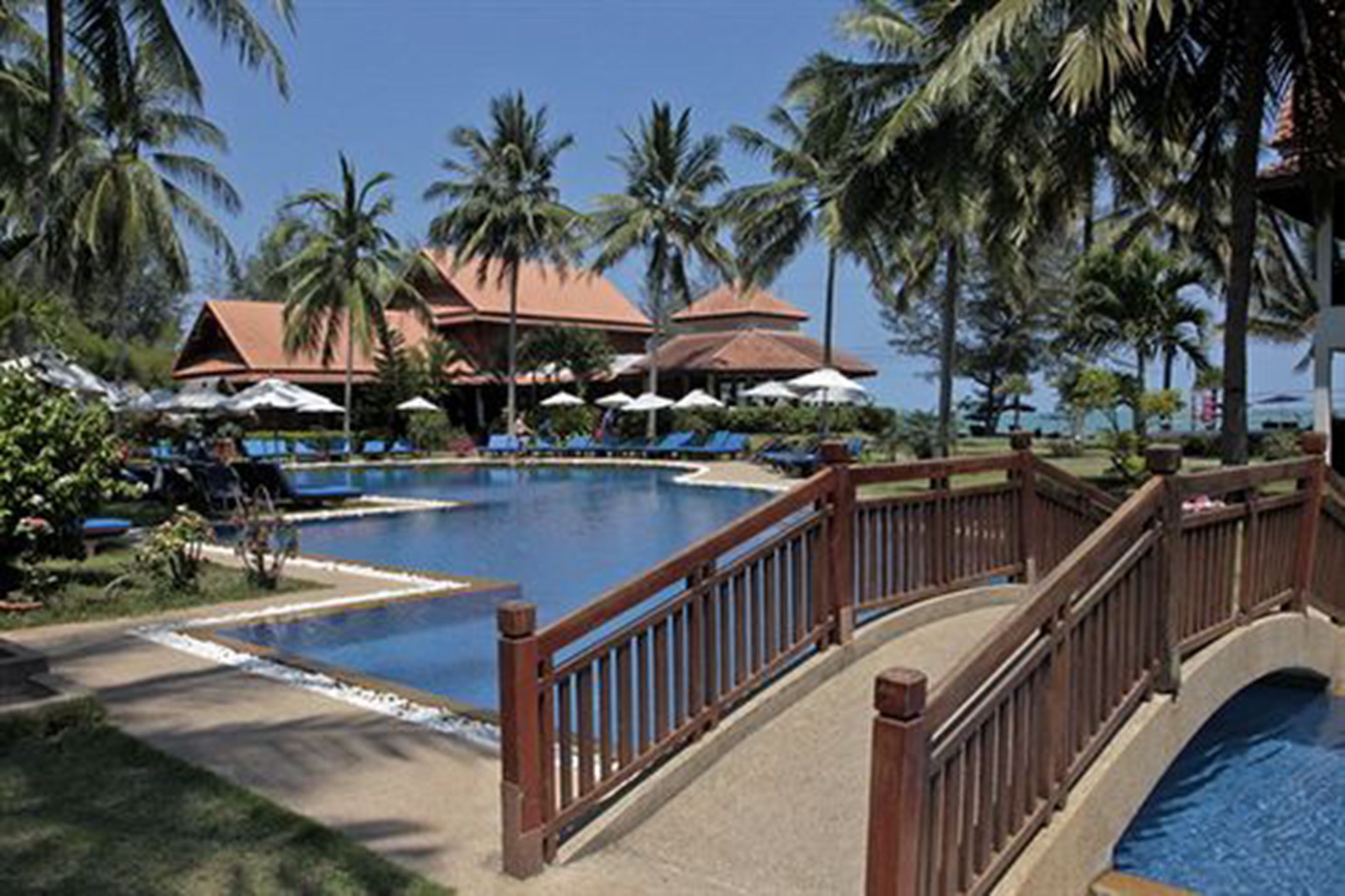 outdoor pool, pool umbrellas, pool loungers