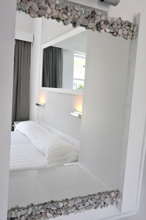 Habitación superior, vista al mar | Sábanas de algodón egipcio y ropa de cama de alta calidad 
