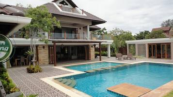 Outdoor pool, pool umbrellas, sun loungers