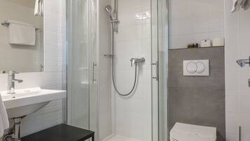 Shower, free toiletries, hair dryer, slippers