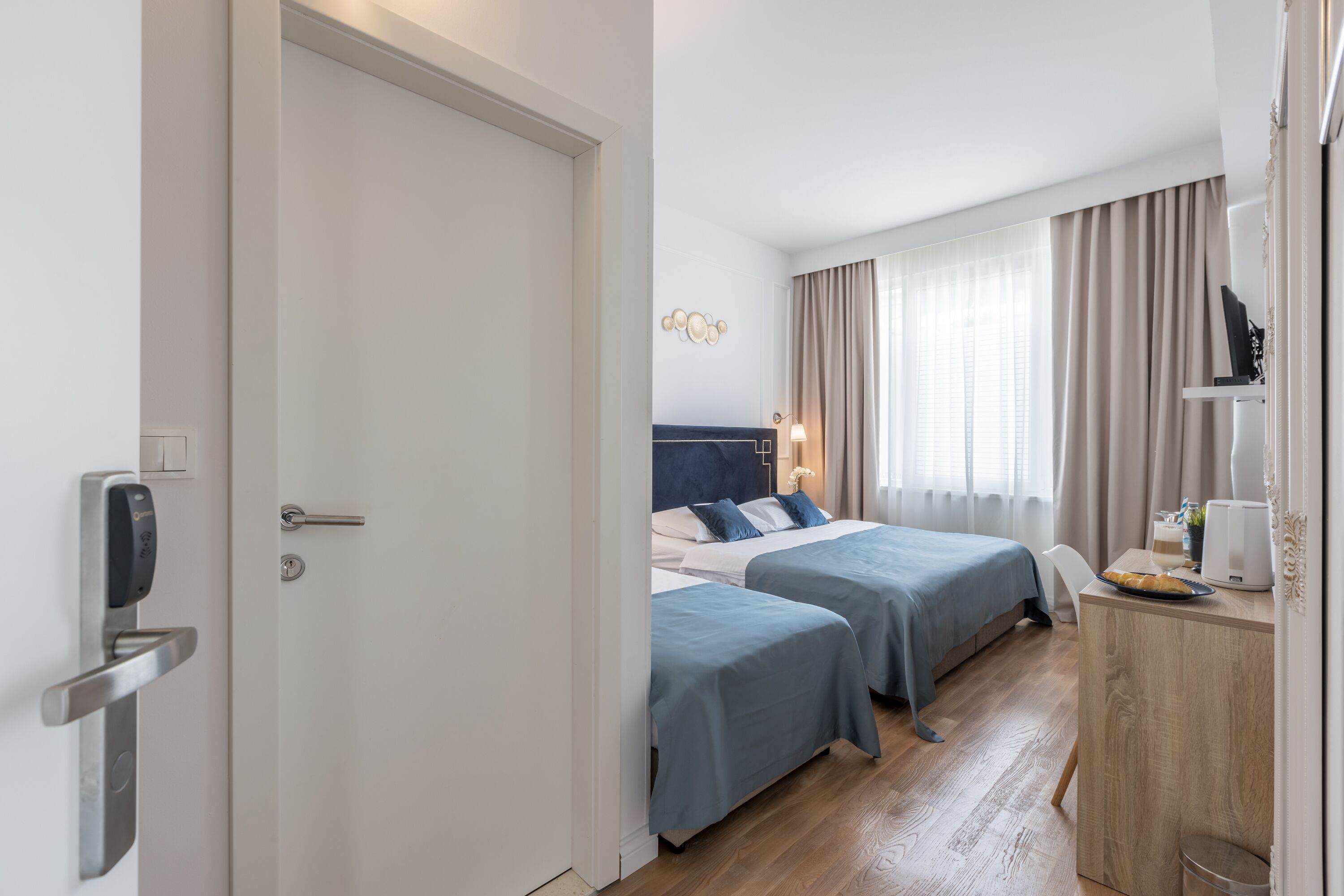 standard triple room | in-room safe, desk, blackout curtains, soundproofing