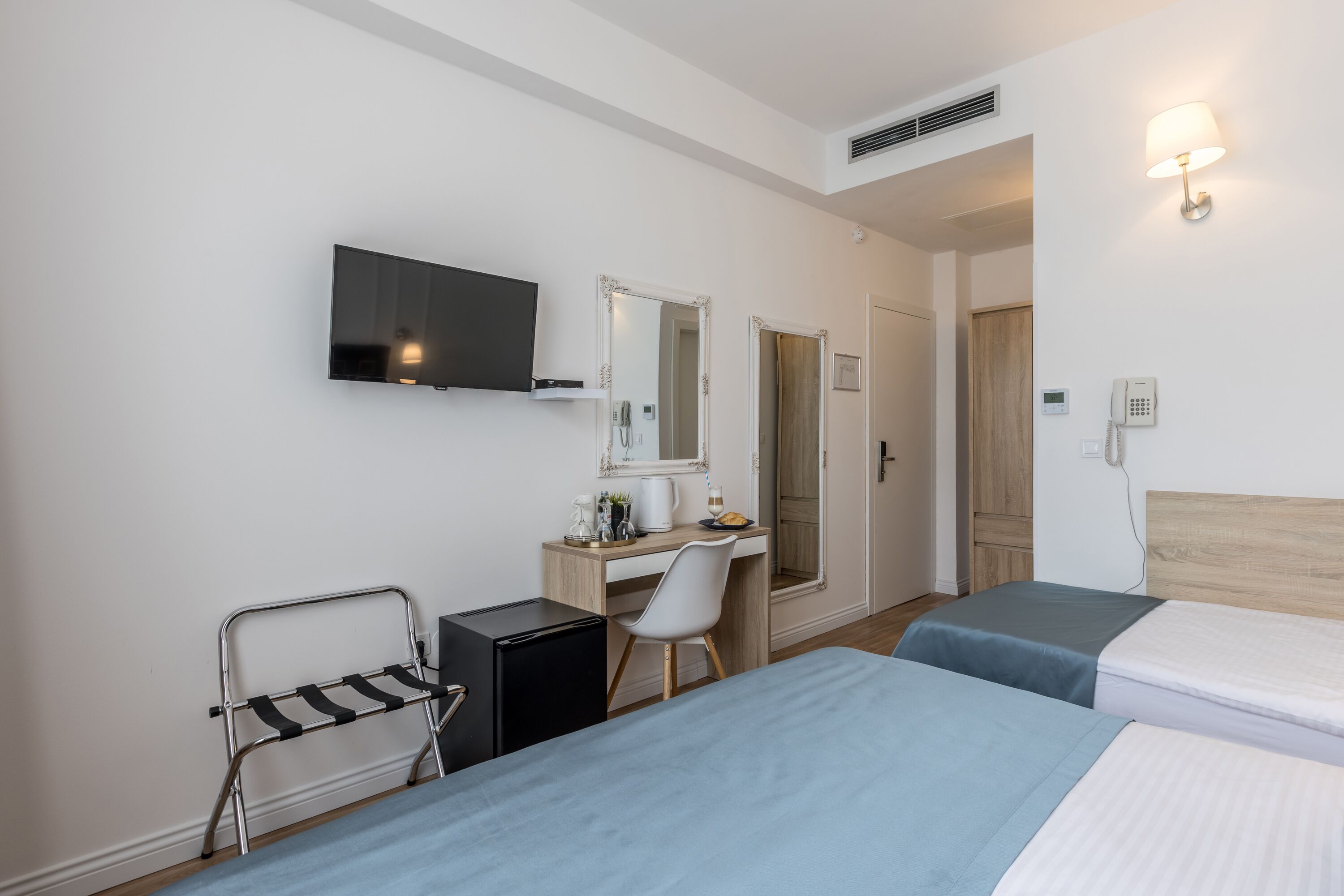 standard triple room | in-room safe, desk, blackout curtains, soundproofing