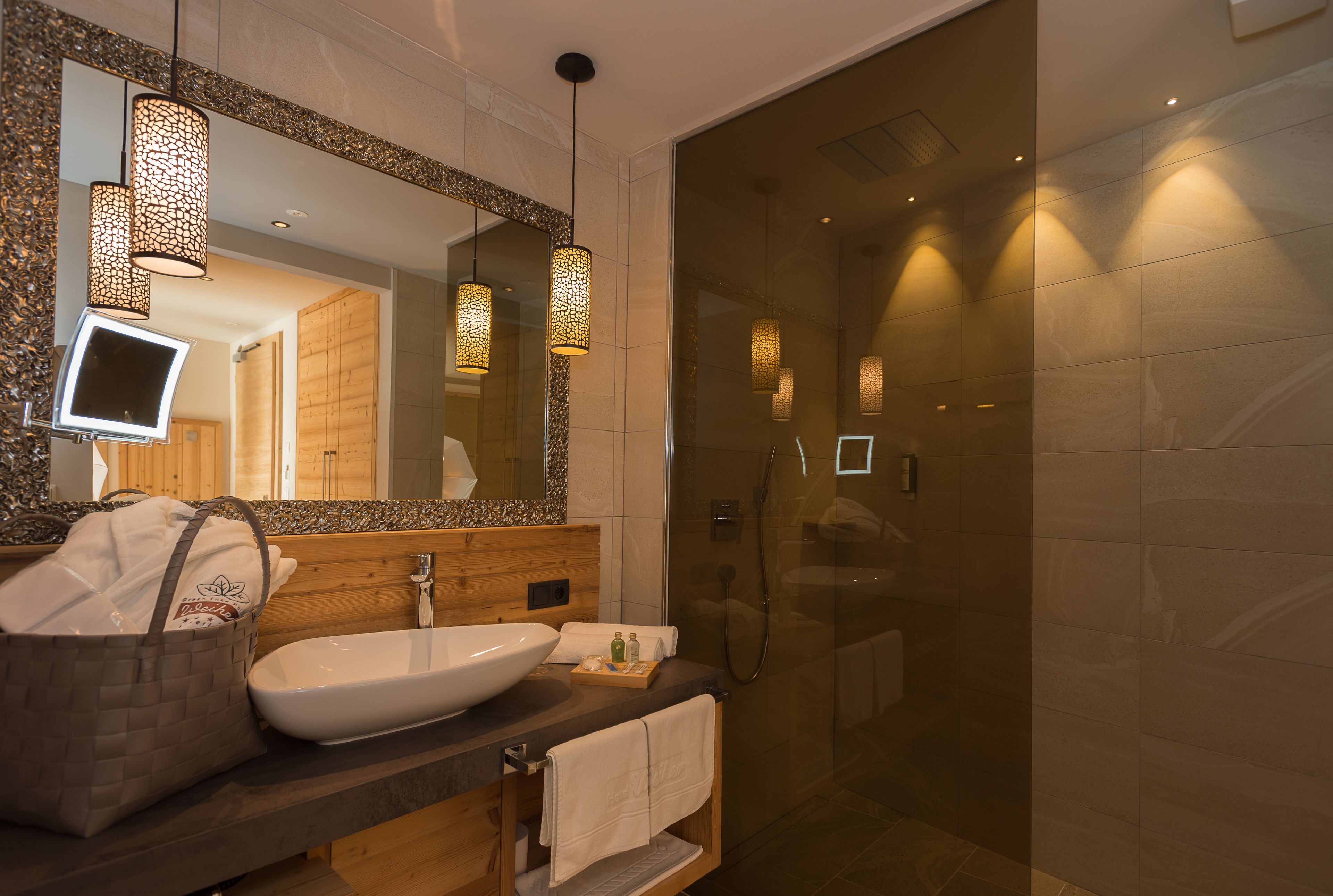 junior suite, lake view, lakeside | bathroom | hair dryer, bathrobes, slippers, bidet