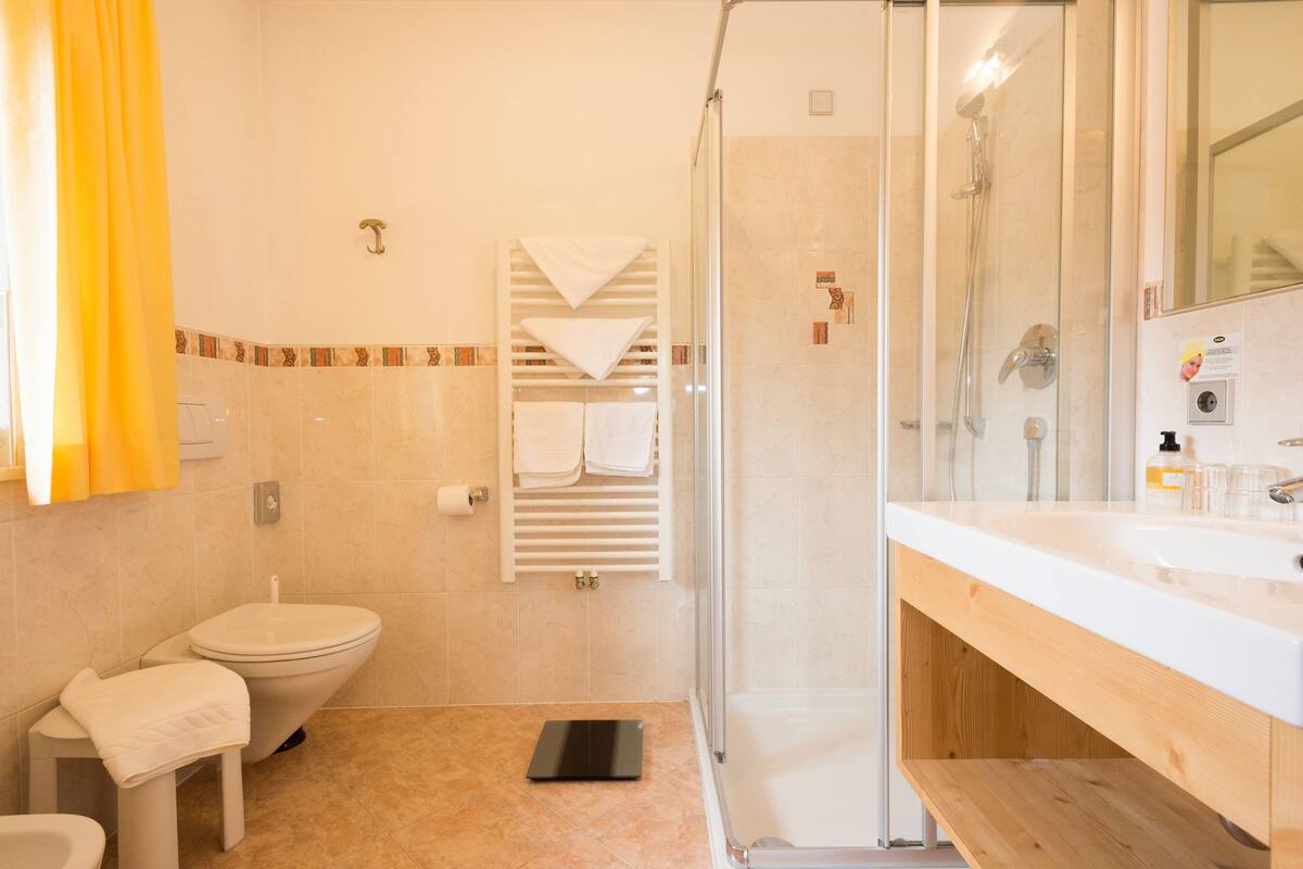classic double room | bathroom | hair dryer, bathrobes, slippers, bidet