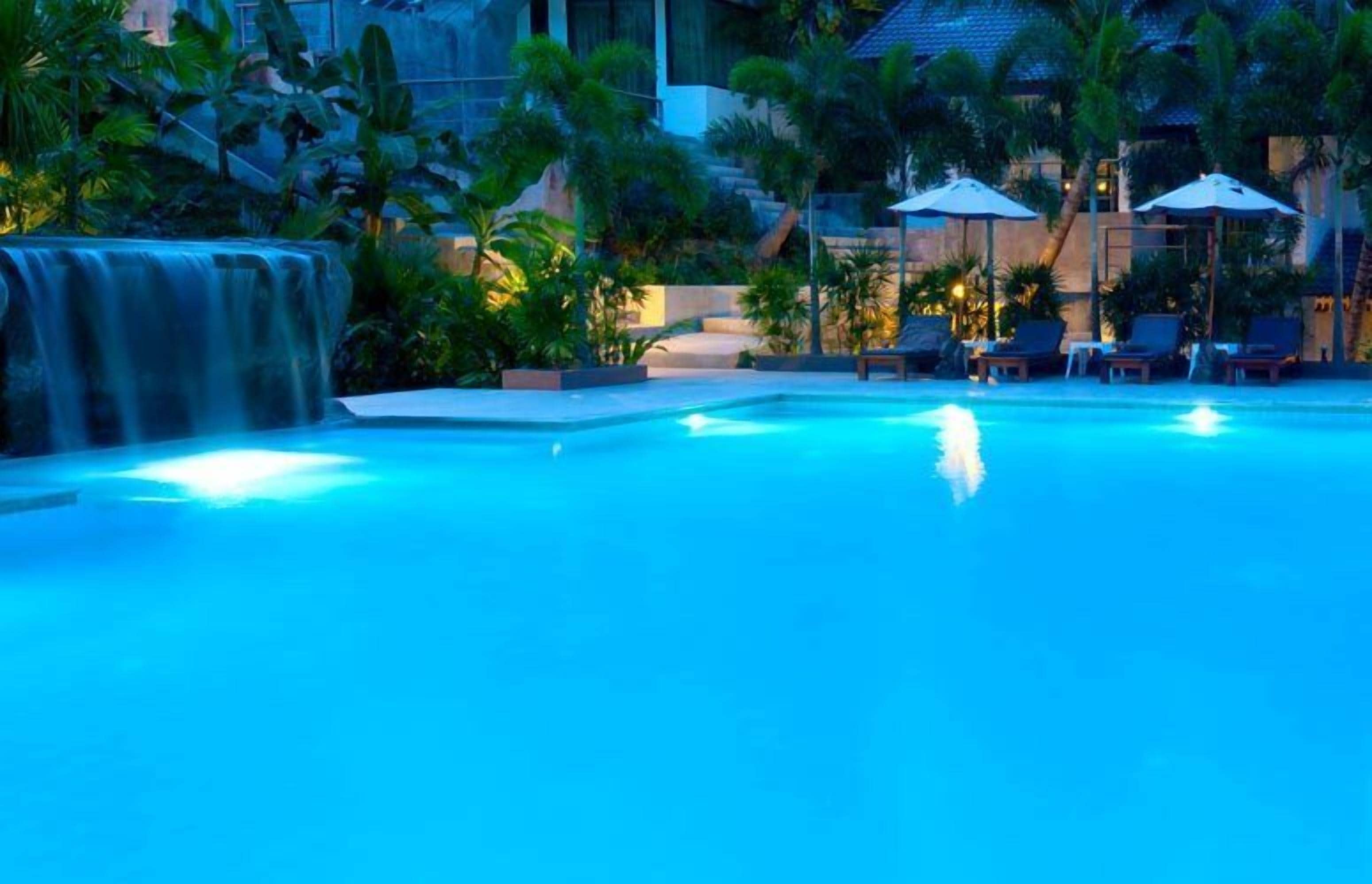 Outdoor pool, pool umbrellas, pool loungers