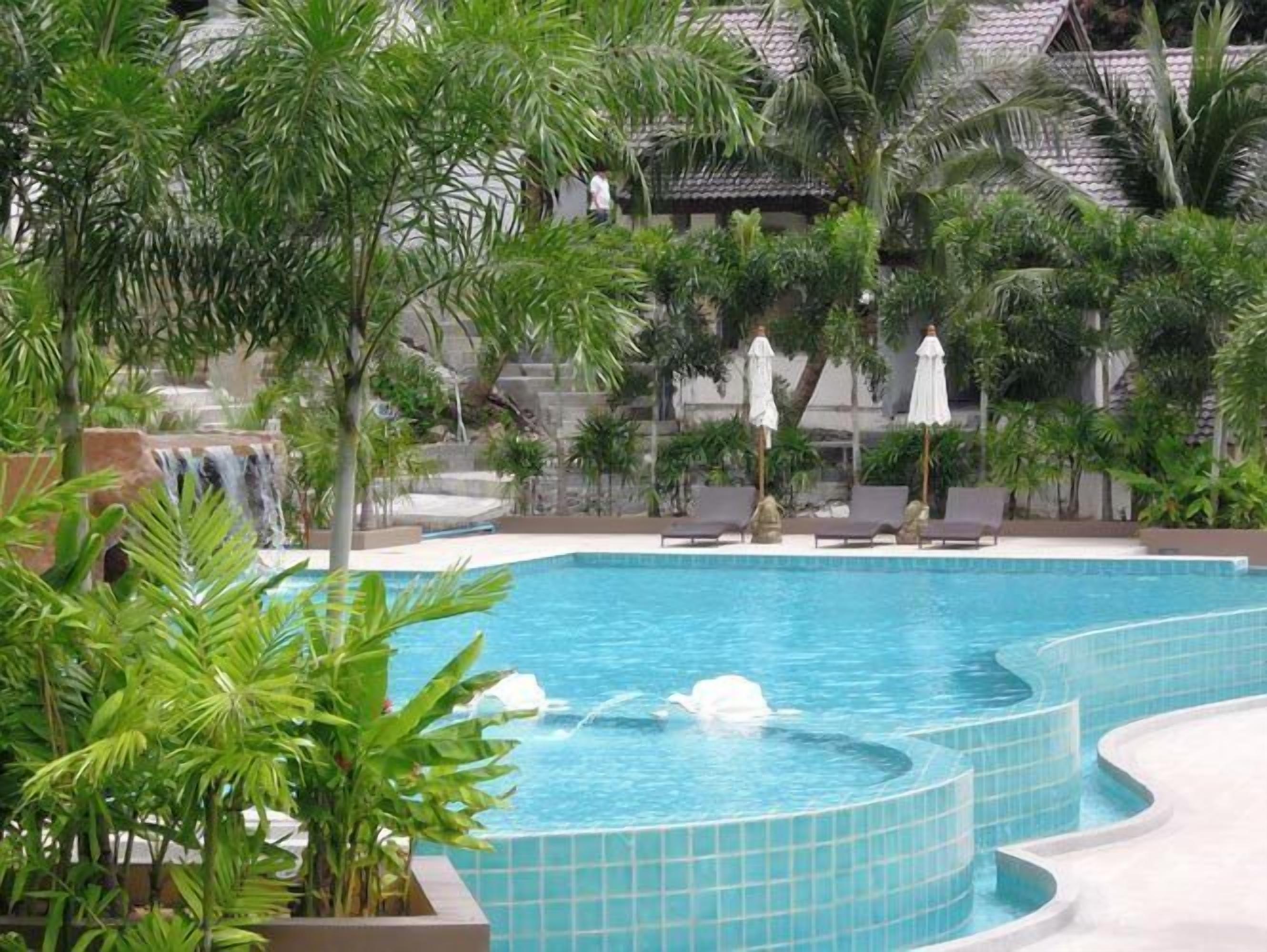 outdoor pool, pool umbrellas, pool loungers