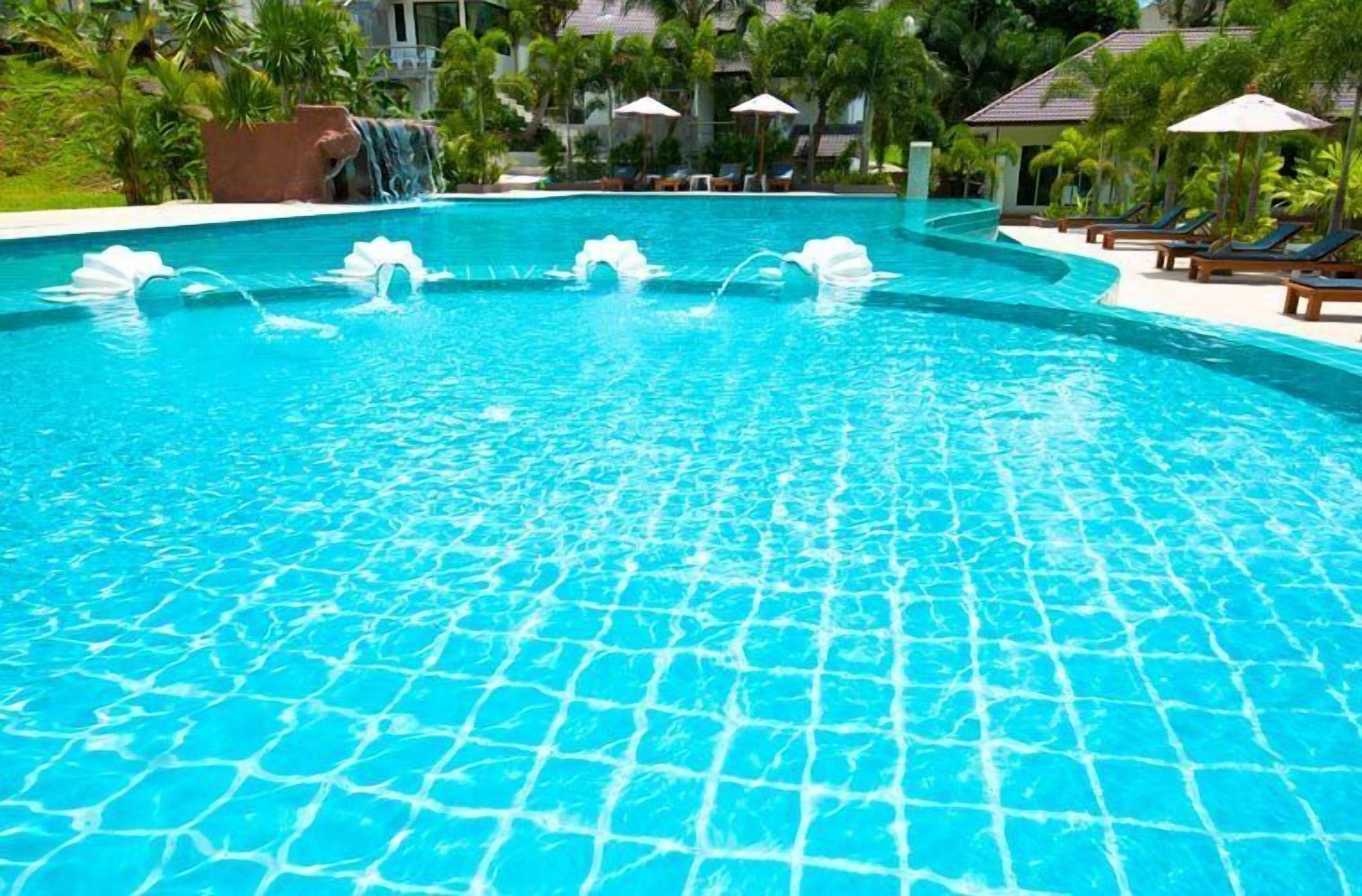 outdoor pool, pool umbrellas, pool loungers