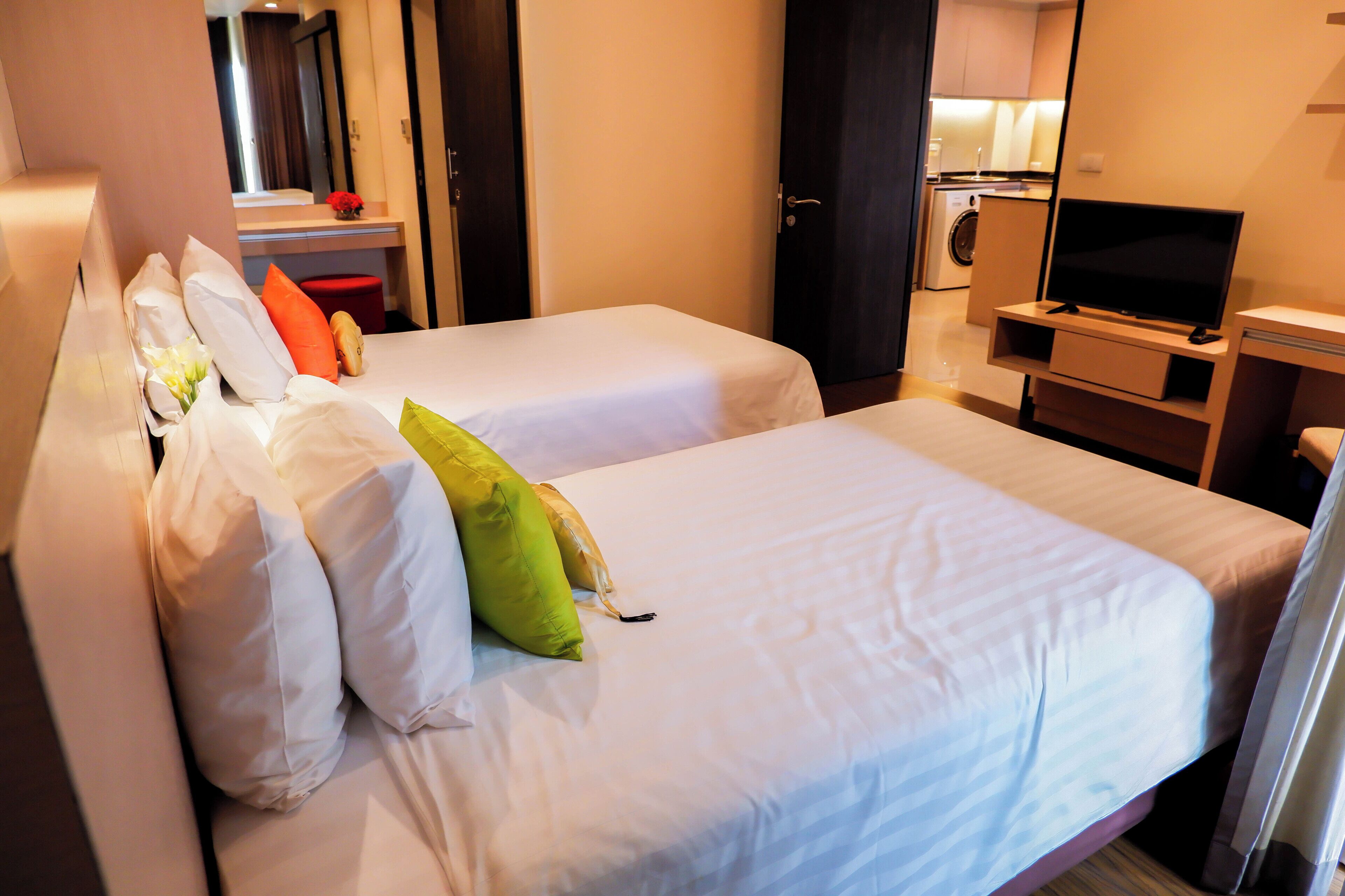 Junior Twin Suite | Escritorio, cortinas blackout, wifi gratis y ropa de cama 