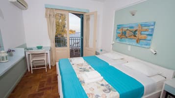 Standard Room, Partial Sea View | In-room safe, bed sheets