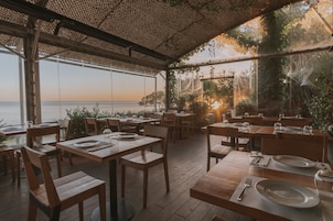 Breakfast, lunch, dinner served; Mediterranean cuisine, ocean views 