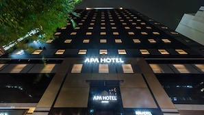 A modern building with the sign "APA HOTEL" prominently displayed. - APA Hotel Higashi Nihombashi Ekimae (Tokyo)