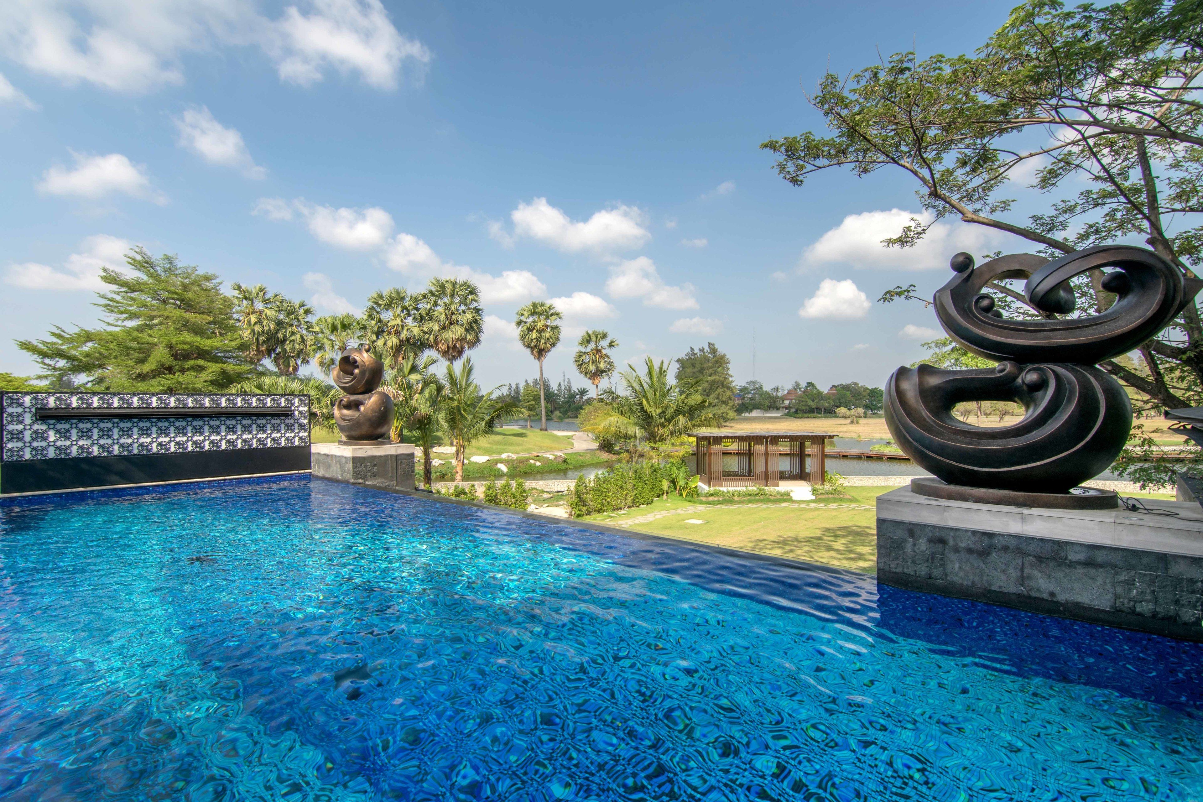 Outdoor pool, open 7:00 AM to 7:00 PM, free pool cabanas, pool umbrellas