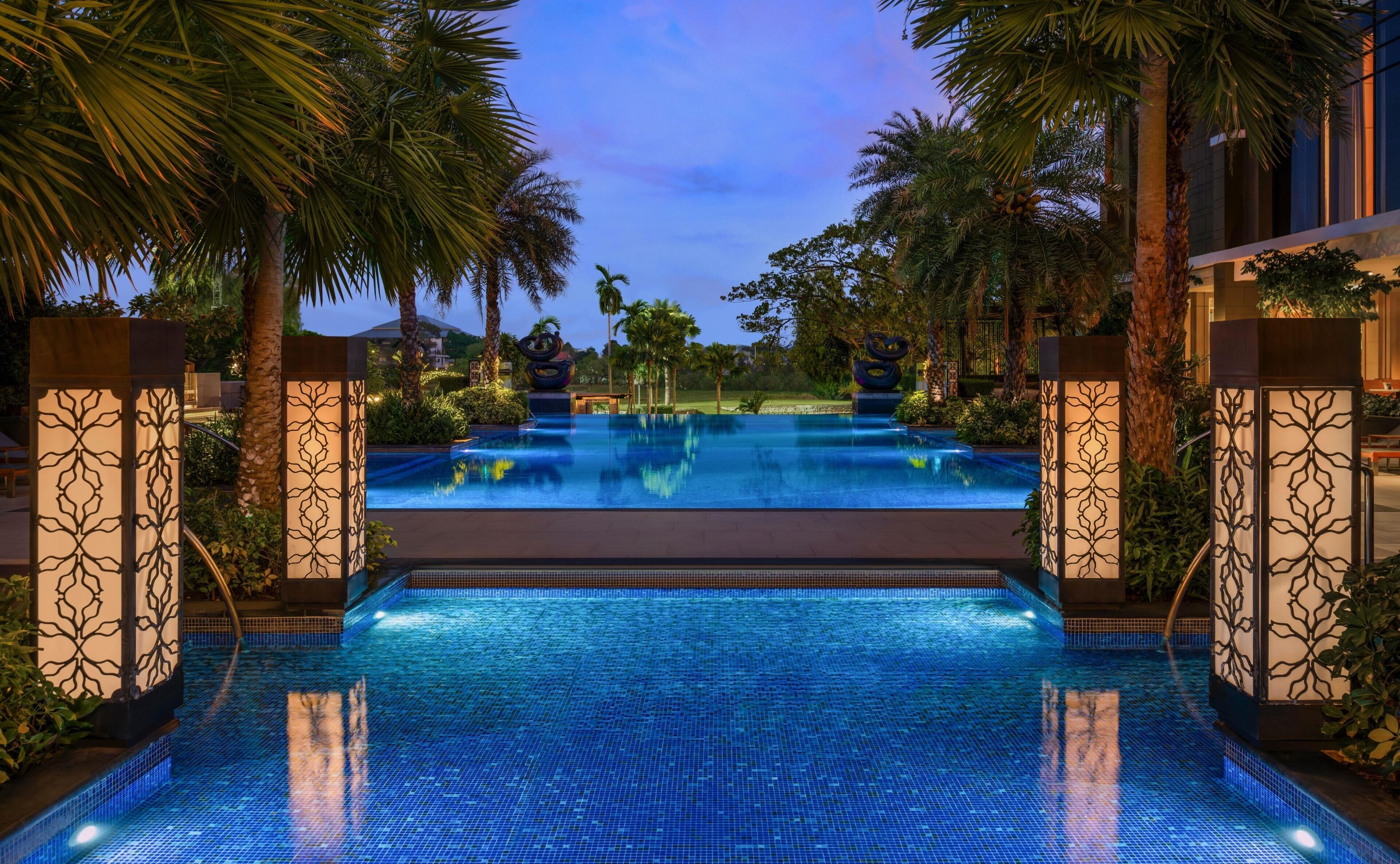 Outdoor pool, open 7:00 AM to 7:00 PM, free pool cabanas, pool umbrellas
