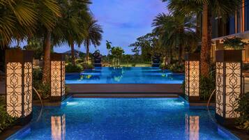 Outdoor pool, open 7:00 AM to 7:00 PM, free pool cabanas, pool umbrellas