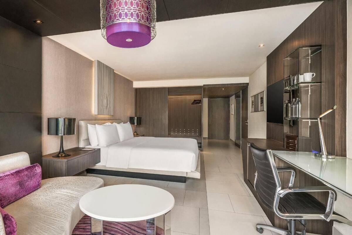 Premium bedding, pillow-top beds, minibar, in-room safe