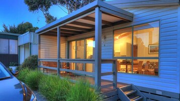 Cabana standard, 3 quartos | Cortinas blackout, ferros/tábuas de passar roupa, roupa de cama