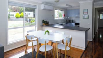 Deluxe Cabin, 4 Bedrooms | Private kitchen | Full-size fridge, microwave, oven, dishwasher