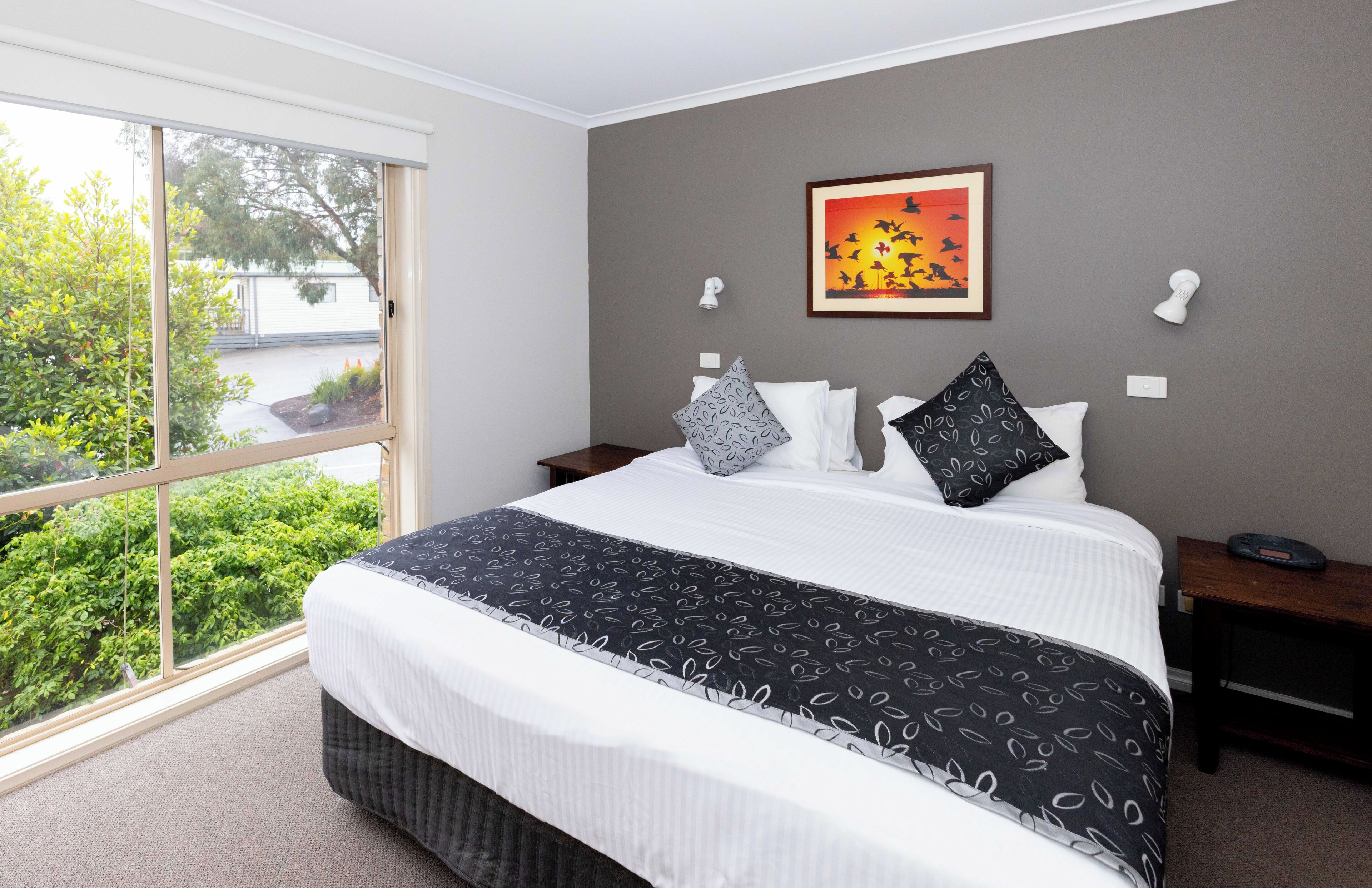 deluxe 1 bedroom apartment | 1 bedroom, blackout curtains, iron/ironing board, bed sheets