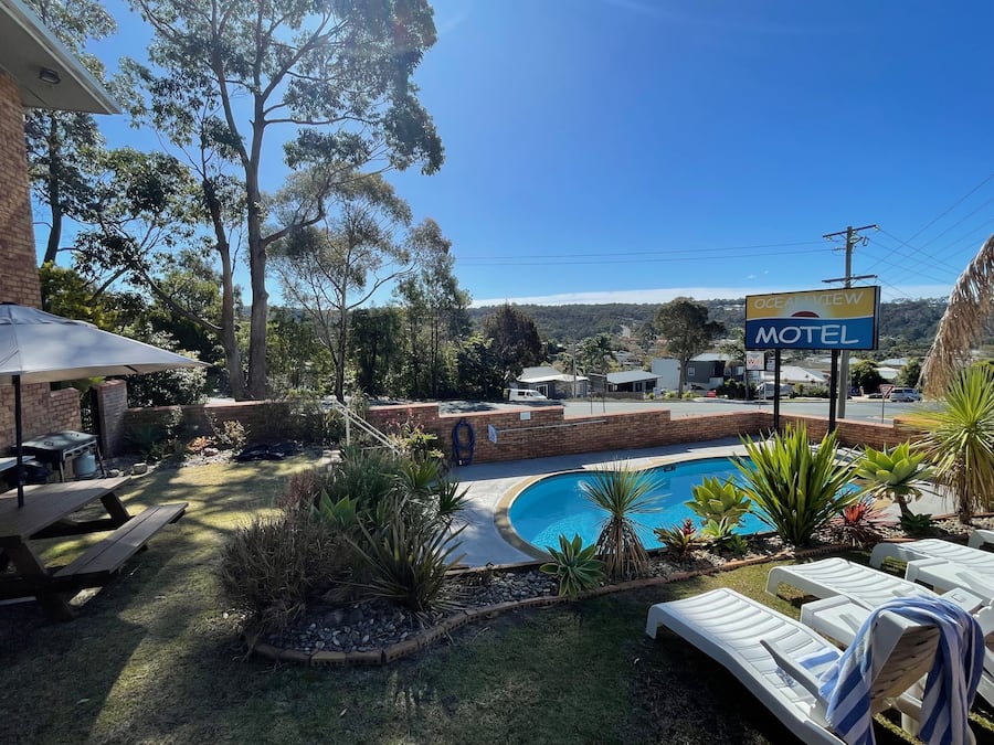 Outdoor pool, pool umbrellas, sun loungers