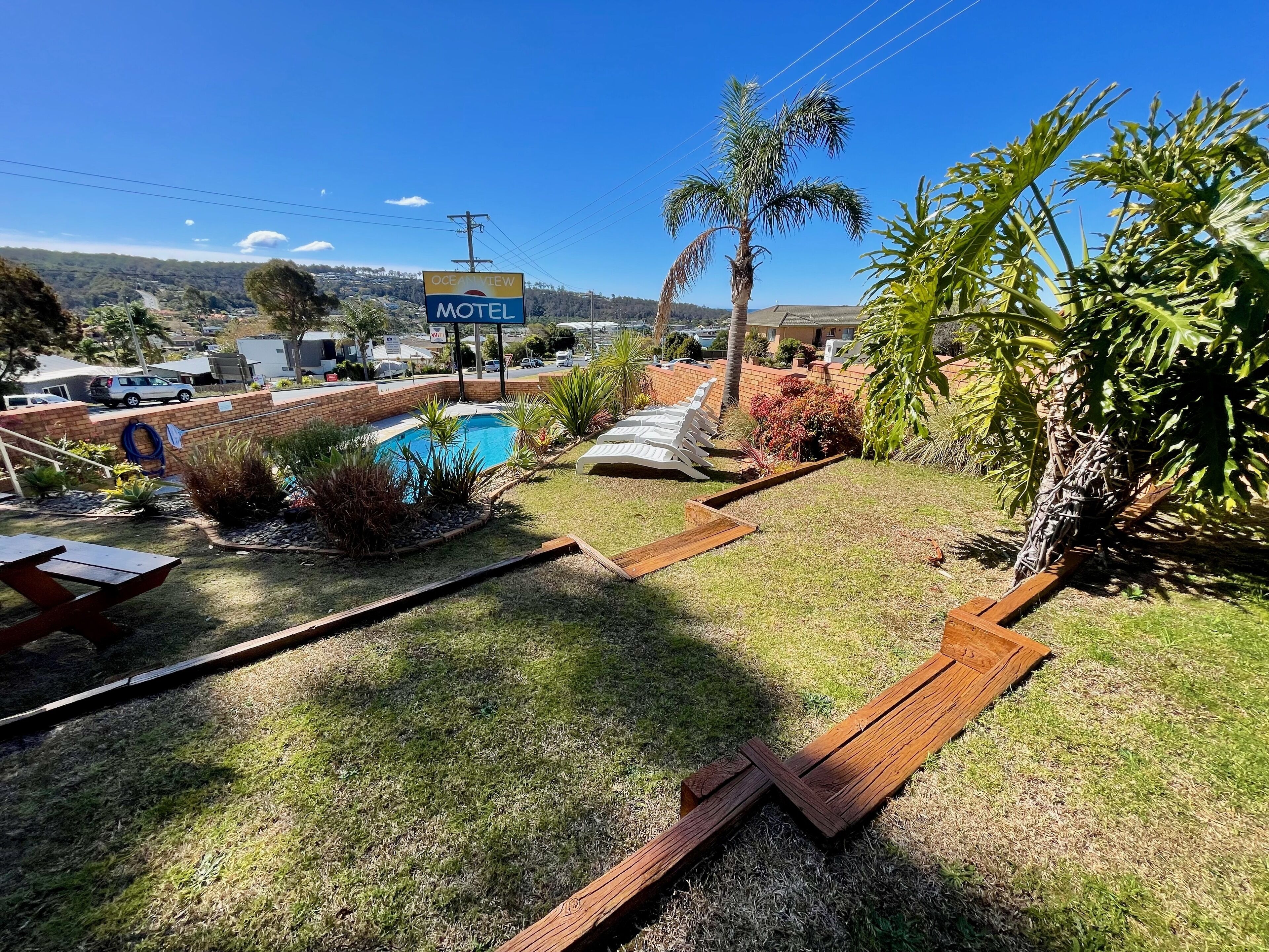 Outdoor pool, pool umbrellas, pool loungers