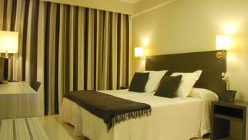 Minibar, caja de seguridad en la habitación, escritorio y wifi gratis