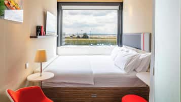 Luxe beddengoed, pillowtop-bedden, een kluis op de kamer, een bureau