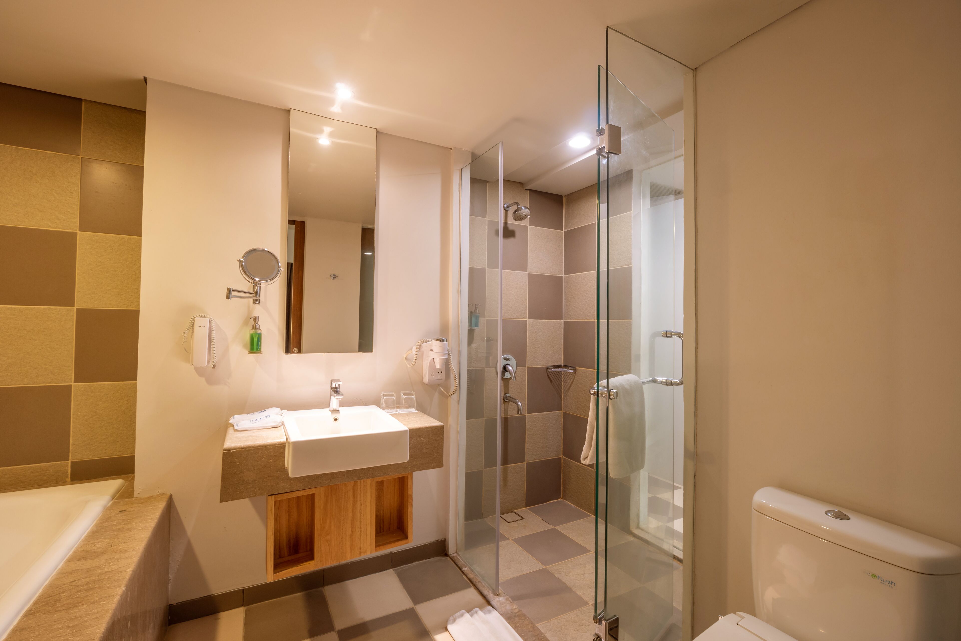 junior suite | bathroom | shower, rainfall showerhead, hair dryer, slippers