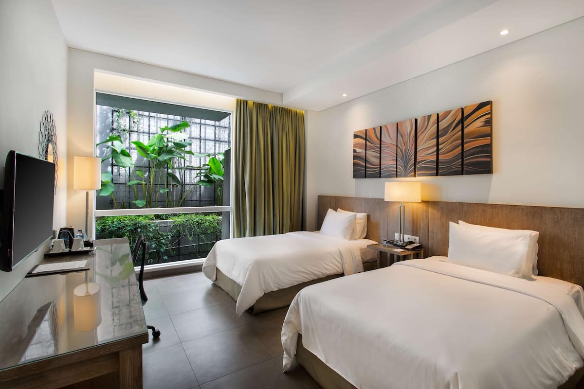 Habitación, 2 camas individuales | Ropa de cama de alta calidad y minibar