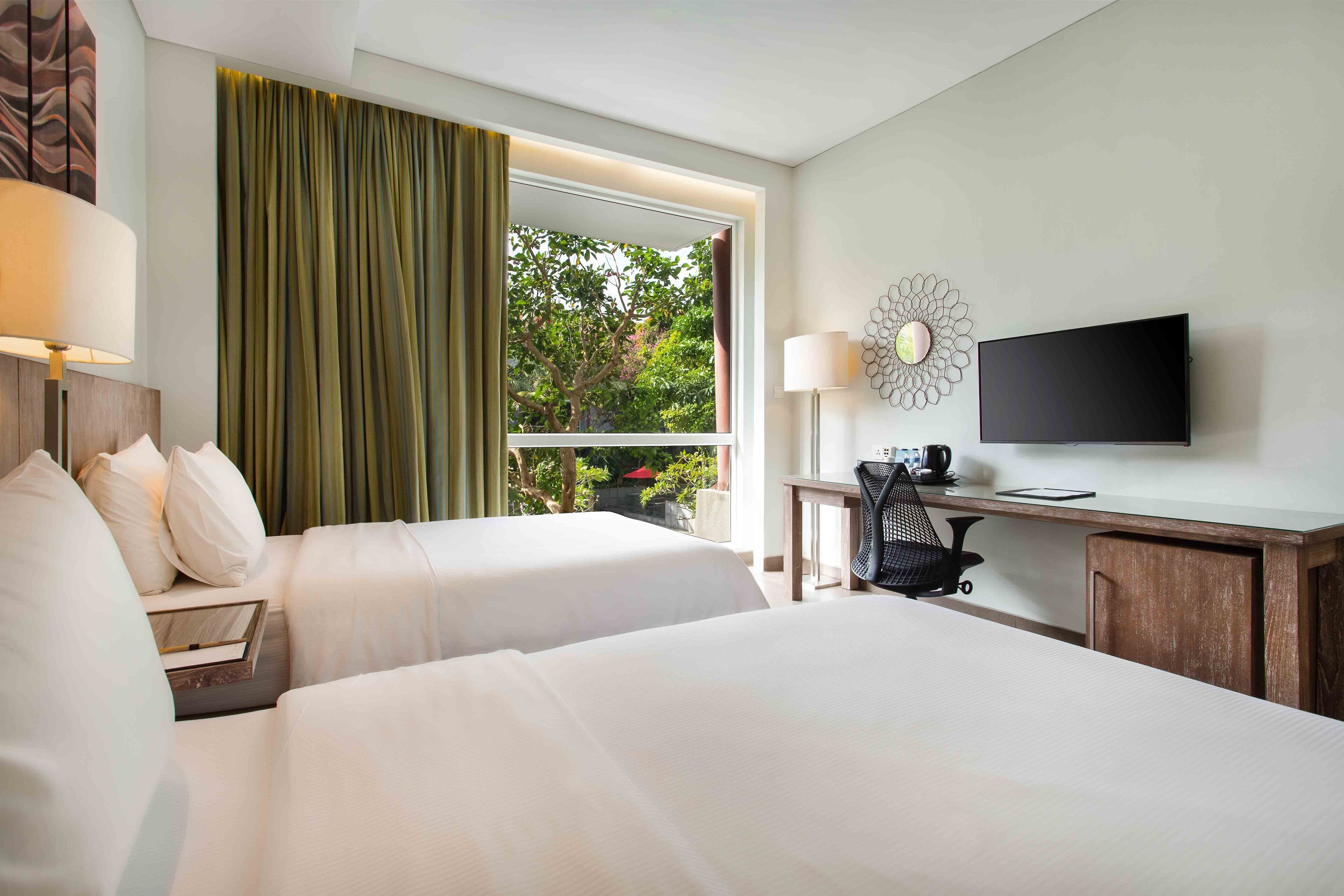 twin room, 2 single beds, pool view | premium bedding, minibar, in-room safe, desk