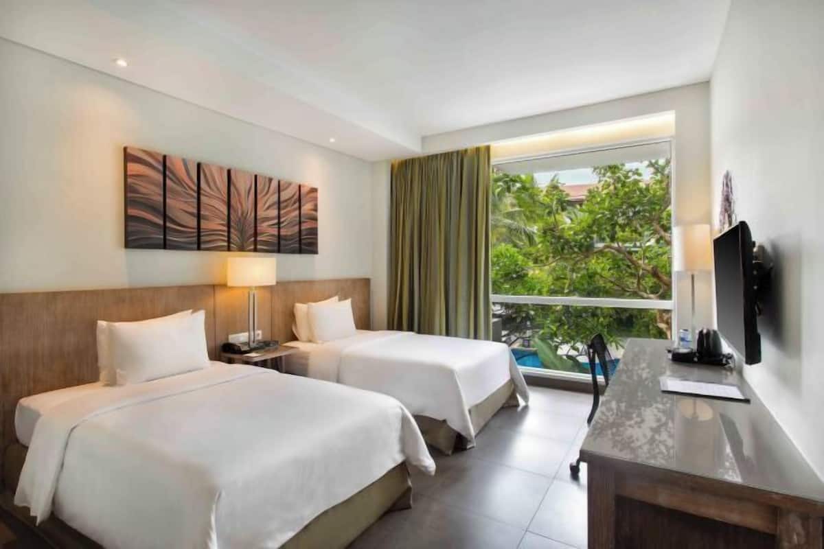 Ropa de cama de alta calidad y minibar