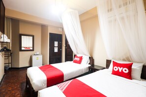 Suíte família | Escrivaninha, Wi-Fi de cortesia, roupa de cama
