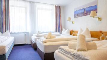 Classic Quadruple Room | Minibar, in-room safe, iron/ironing board, free WiFi