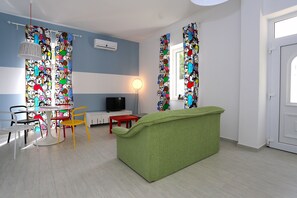 Apartment, 1 Bedroom | Living area | LCD TV