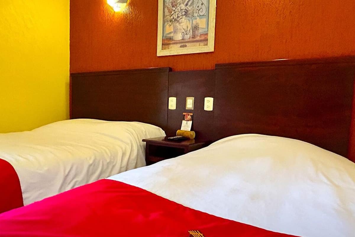 Family Triple Room | Down comforters, individually decorated, individually furnished